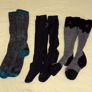 Smartwool and Darn Tough Women's Gray and Black Socks with Teal Accents